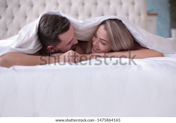 Cute Loving Couple Lying Under The Blanket 5108