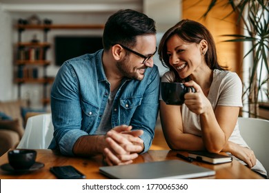 Cute loving couple relaxing at home, portrait. - Powered by Shutterstock