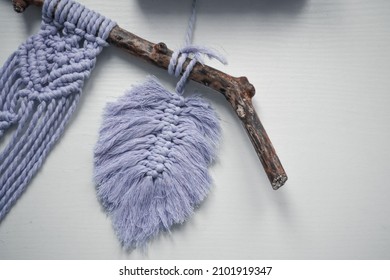 Cute Macrame Feather On Light Background