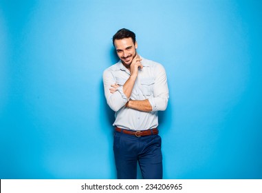 Cute Man Casual Dressed On A Blue Background