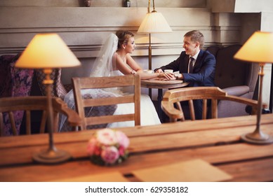 Cute married couple in cafe