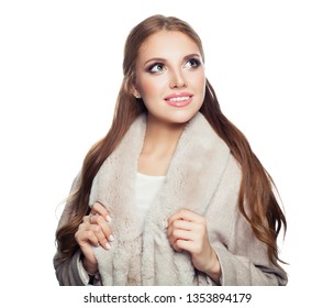 Cute model woman wearing beige coat looking up isolated on white background - Shutterstock ID 1353894179