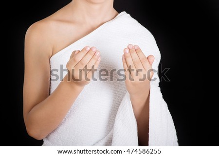 Cute Muslim Kid Praying While Wearing Ihram ( White Traditional Islamic Clothes ) During Hajj