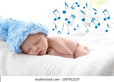 Cute Newborn Baby In Knitted Hat Sleeping On Bed And Flying Music Notes. Lullaby Song