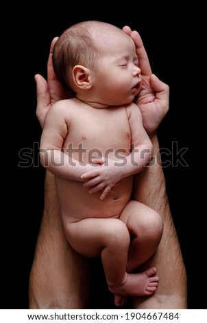 Similar – Baby girl four months old having her bath