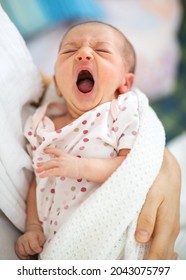 Cute newborn baby yawn before sleep.