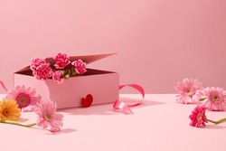 Cute Pink Background With Gerberas And Fresh Carnations Decorated. Sweet And Romantic Women's Day Decoration Ideas. Empty Space For Product Presentation, Front View