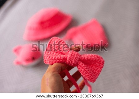 Cute pink crochet items in barbiecore style