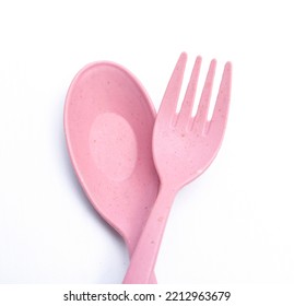 Cute Pink Fork And Spoon Isolated On White Background