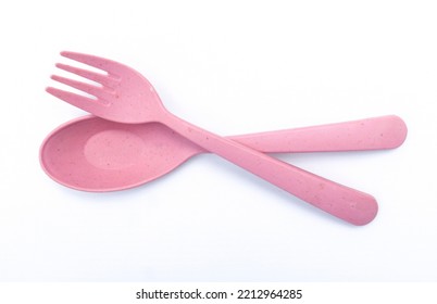 Cute Pink Fork And Spoon Isolated On White Background