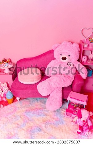 Cute pink room interior full of stuffed animals and toys.