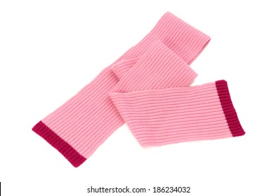 Cute pink winter scarf nicely arranged. Wool scarf isolated on white background.