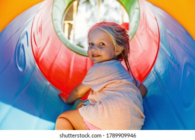 Cute preschooler girl walking outdoor on playground at summer. Lonely during covid-19 quarantine. Child can't play with friends while coronavirus pandemic. - Powered by Shutterstock