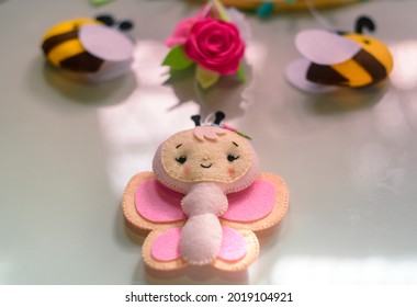 Cute Prop For Baby Cot Mobile Closes Up. Felt Plush Bees With Flowers Design.