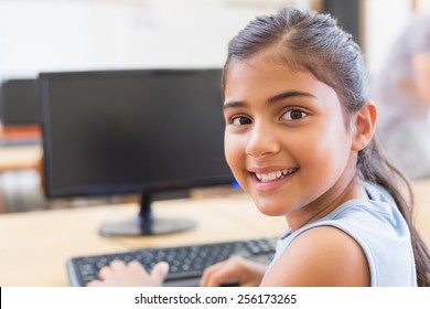 Cute Pupil In Computer Class At The Elementary School