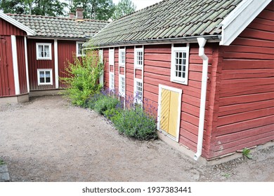 Cute Red Houses Of Small Town Of Vimmerby.  Astrid Lindgren's World Theme Park, Vimmerby, Sweden. Space For Copy. 