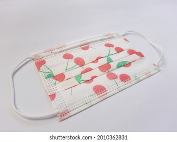 Cute Single Use Mask For Kids With Cherry Pattern On An White Background