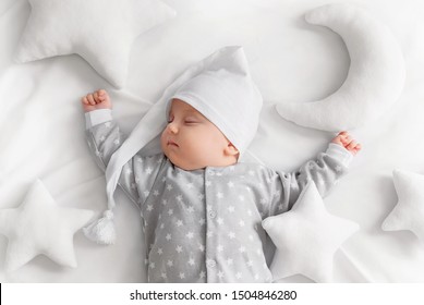 Cute sleeping baby in the bed