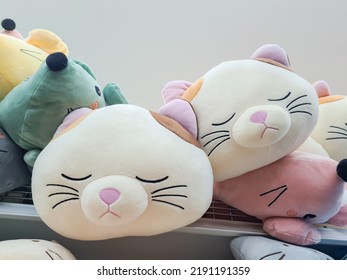 Cute Sleeping Cat Plush Pillow On The Shelf. Cat Sweet Dreams 