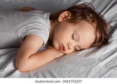 Cute small baby sleeping on the blanket - Powered by Shutterstock