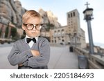 A cute small kid is posing on background