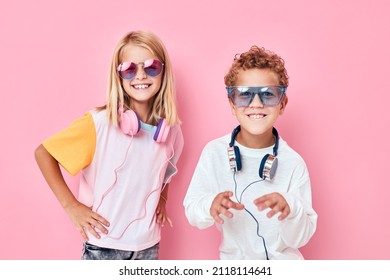 Cute Smiling Kids In Sunglasses Have Fun With Friends Listening Music