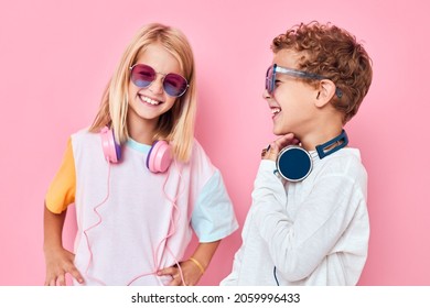 cute smiling kids wearing headphones posing Childhood lifestyle concept - Powered by Shutterstock