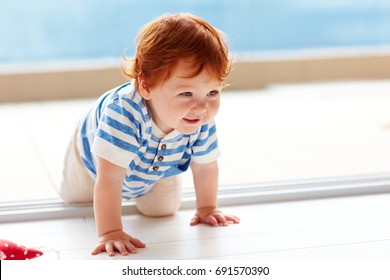 Cute Smiling Toddler Baby Crawling On The Floor