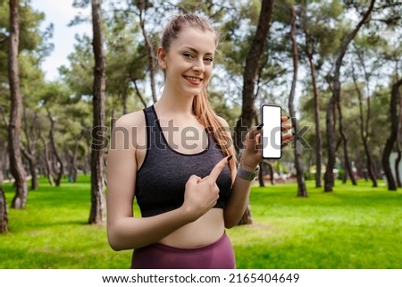 Similar – Attractive sporty woman with her cell phone