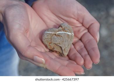 Cute Stone Hearth In A Womans Hands