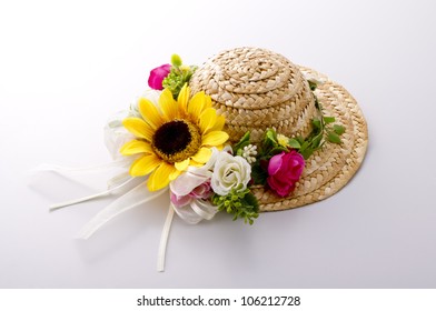 straw hat with flowers