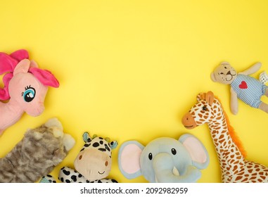 Cute Stuffed Animal Head On Yellow Background With Flatlay Concept