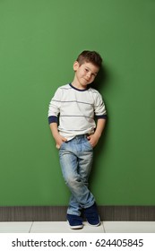 Cute Stylish Boy Near Color Wall