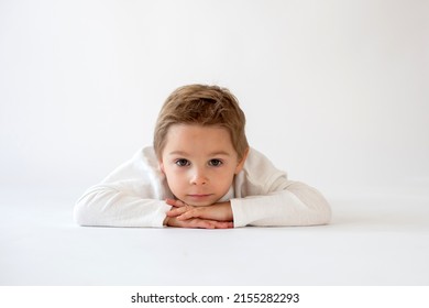 Cute Stylish Toddler Child And Older Brothers, Boys With White Shirts On White Background, Family Kids Portrait, Studio Shot