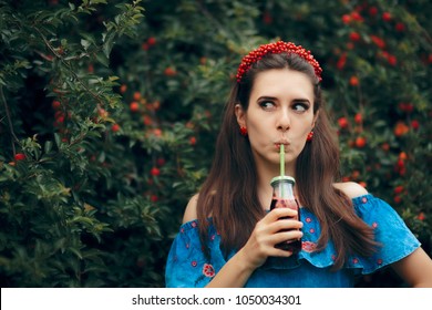 Cute Summer Girl Drinking Cherry Fruit  Juice Outdoors. Beautiful Woman Drinking Fresh Drink With No Added Sugar With A Straw

