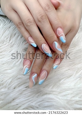 Cute swirl nails design natural pink, blue and white gel color