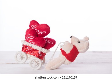 Cute teddy bear carry love heart items on white bicycle - Powered by Shutterstock