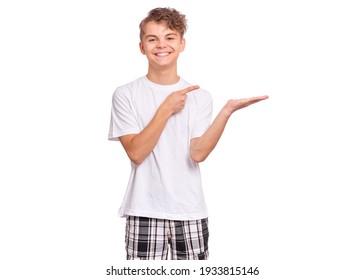 Cute Teen Boy Pointing Up, Gesturing Idea Or Doing Number One Gesture, Isolated On White Background