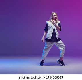 Cute Teen Girl Dancing Hip-hop In Stylish Black And White Clothes, In A Studio With Neon Lighting. Dance Color Poster.