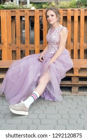 ball gown and sneakers