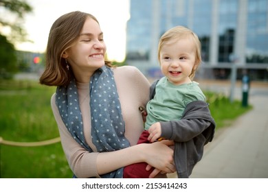 Cute Teenage Sister Cuddling With Her Toddler Brother. Adorable Teenage Girl Holding Baby Boy. Children With Large Age Gap. Big Age Difference Between Siblings.