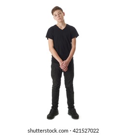 Cute Teenager Boy In Black T-shirt Standing Over White Isolated Background Full Body