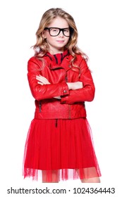 Cute Ten Year Old Girl Posing In Studio In Red Leather Jacket, Skirt. Isolated Over White. Beauty, Fashion.