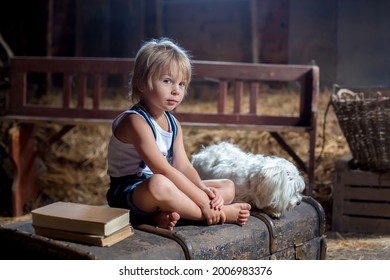 Cute Toddler Child, Blond Boy, Sitting On A Big Suitcase In The Attic, With His Pet Dog, Watching Sad Out Of The Window