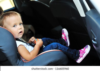 Cute Toddler Girl In Car Seat