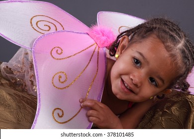 Cute Toddler Girl In Pink Wings