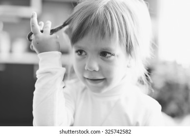 Cute Toddler Girl With Scissors Wants To Cut Hair