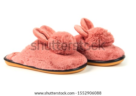 Cute warm fluffy women's Bunny Slippers isolated on white background