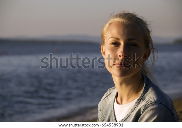 Cute Whitehaired Girl Sitting On Sandy Stock Photo Edit Now