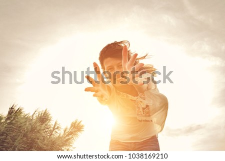 Similar – Image, Stock Photo A woman opens the yellow garbage can